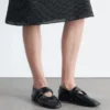 Ballerinas mit gekreuzten Riemen