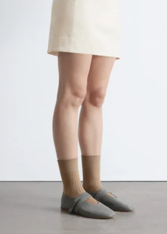 Ballerinas mit gekreuzten Riemen