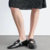 Ballerinas mit gekreuzten Riemen