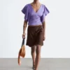 Bluse mit Rüschen und V-Ausschnitt