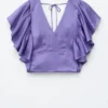 Bluse mit Rüschen und V-Ausschnitt