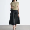 Geraffter Midirock aus Twill