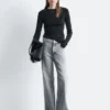 Jeans mit Nieten und Wide-Leg-Jeans