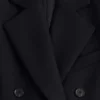 Langer Wollmantel