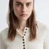 Merino-Wolloberteil mit halber Knopfleiste