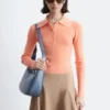 Polo-Shirt aus Merinowolle mit Rippstrick