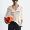 Polo-Shirt aus offenem Strick