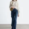 Press-Crease-Jeans mit ausgestelltem Bein