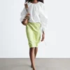 Skulpturale Bluse mit Kordelzug
