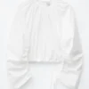 Skulpturale Bluse mit Kordelzug