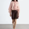 Voluminöse Bluse mit Bindedetails