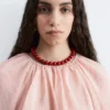Voluminöse Bluse mit Bindedetails