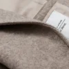 Voluminöser Wollmantel mit Gürtel